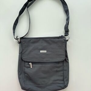 Women’s Baggallini Charcoal Crossbody Bag With Bright Pink Lining.